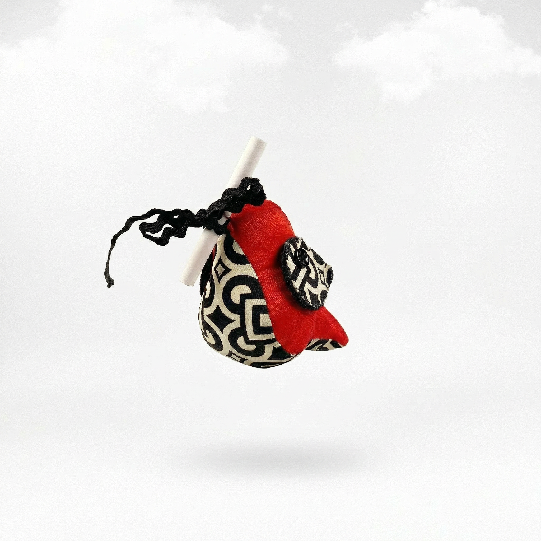 Messenger Bird – Der leidenschaftliche Rot-Schwarz-Weiß Briefbote mit geometrischem Muster & Magnet