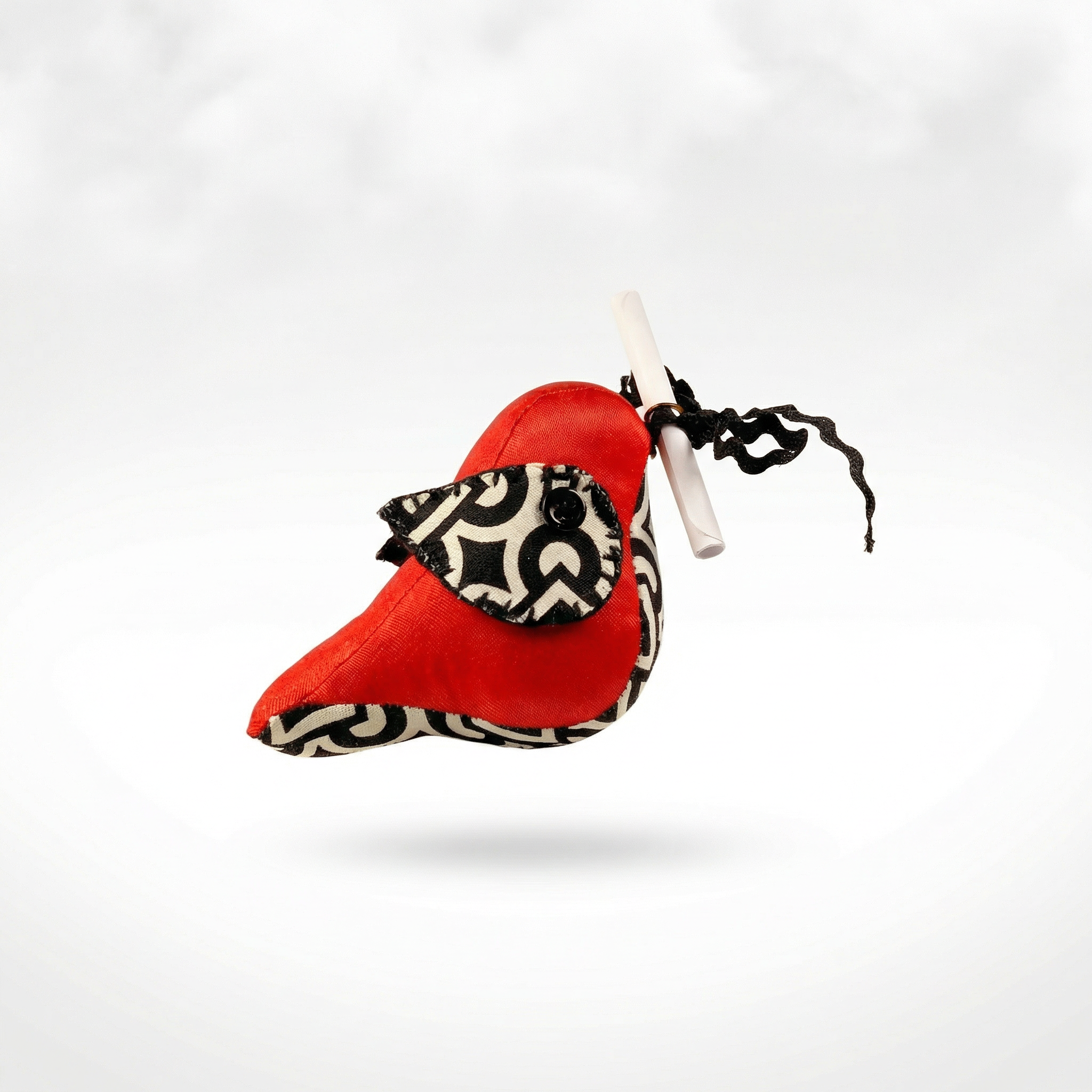 Messenger Bird – Der leidenschaftliche Rot-Schwarz-Weiß Briefbote mit geometrischem Muster & Magnet